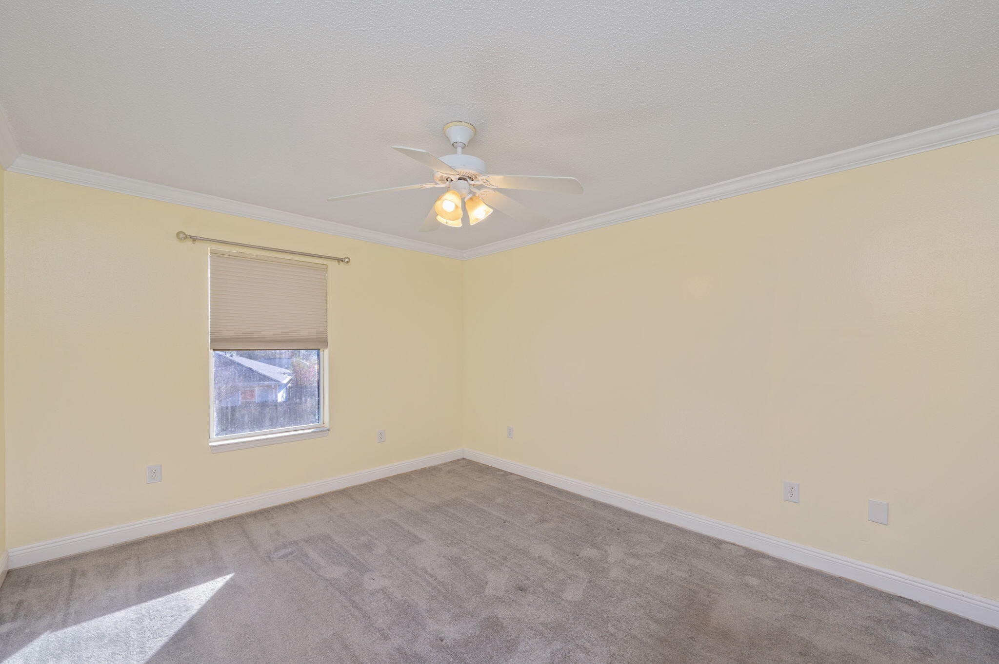410 Winddrift Court Crestview, FL 32536 - Photo 17 of 44 an empty room with a window