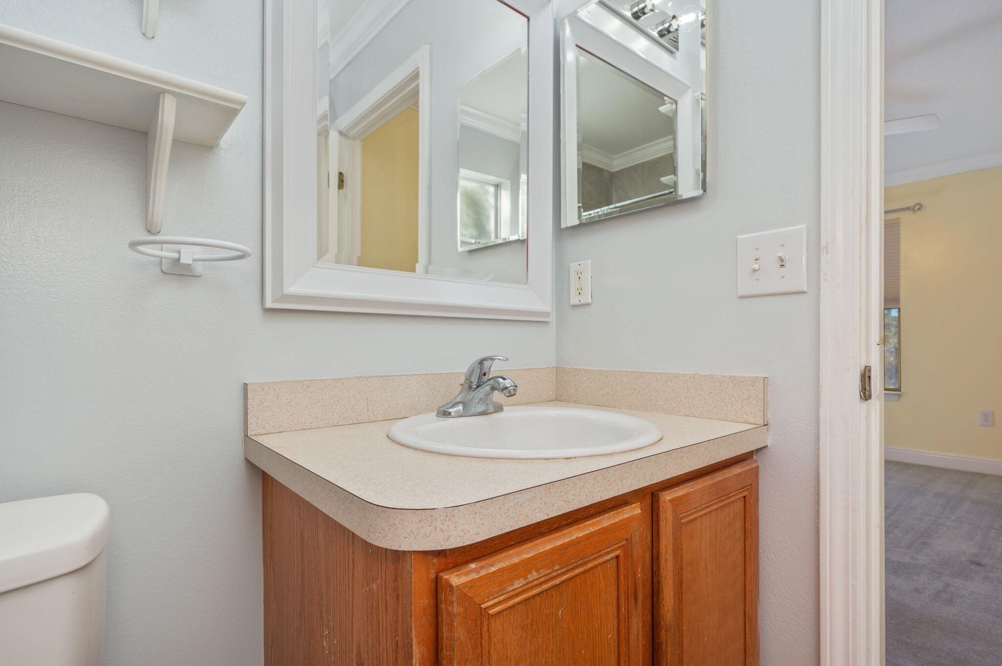 410 Winddrift Court Crestview, FL 32536 - Photo 22 of 44 a bathroom with a sink and a mirror