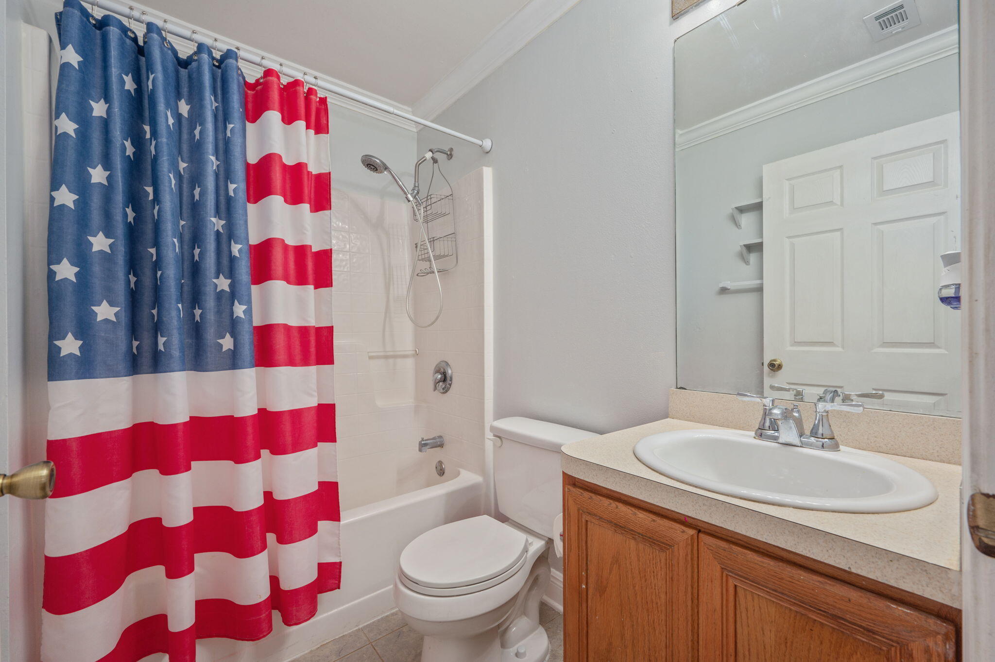 410 Winddrift Court Crestview, FL 32536 - Photo 28 of 44 a bathroom with a sink toilet and shower