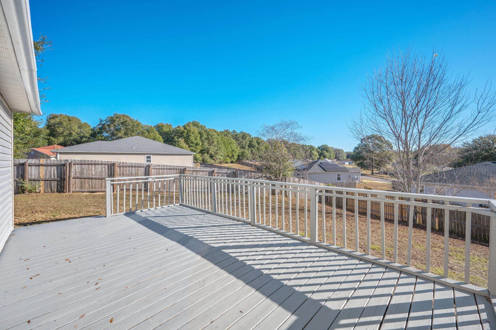 410 Winddrift Court Crestview, FL 32536 - Photo 33 of 44 a view of a house with a roof deck