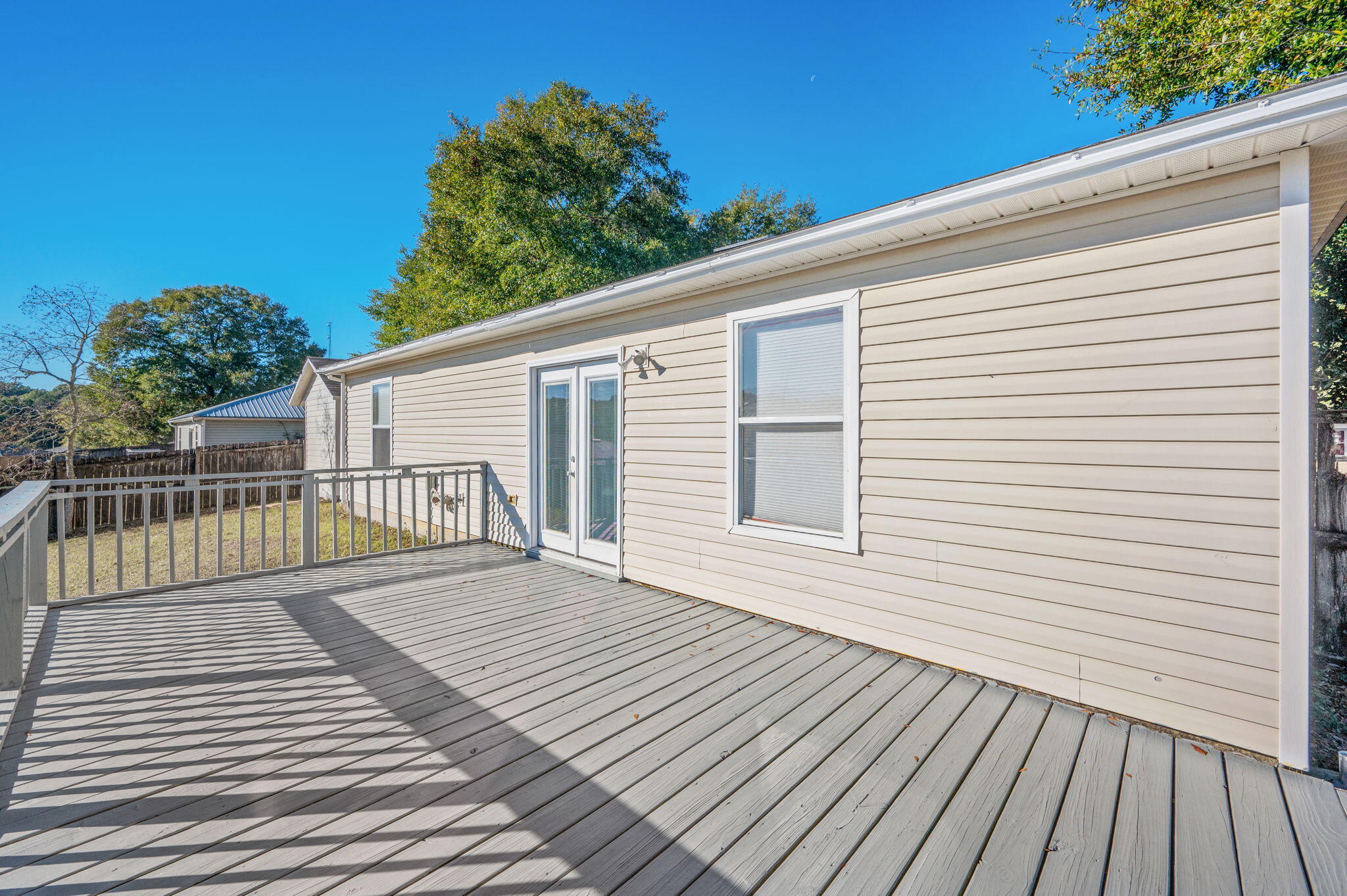 410 Winddrift Court Crestview, FL 32536 - Photo 34 of 44 a view of a wooden deck
