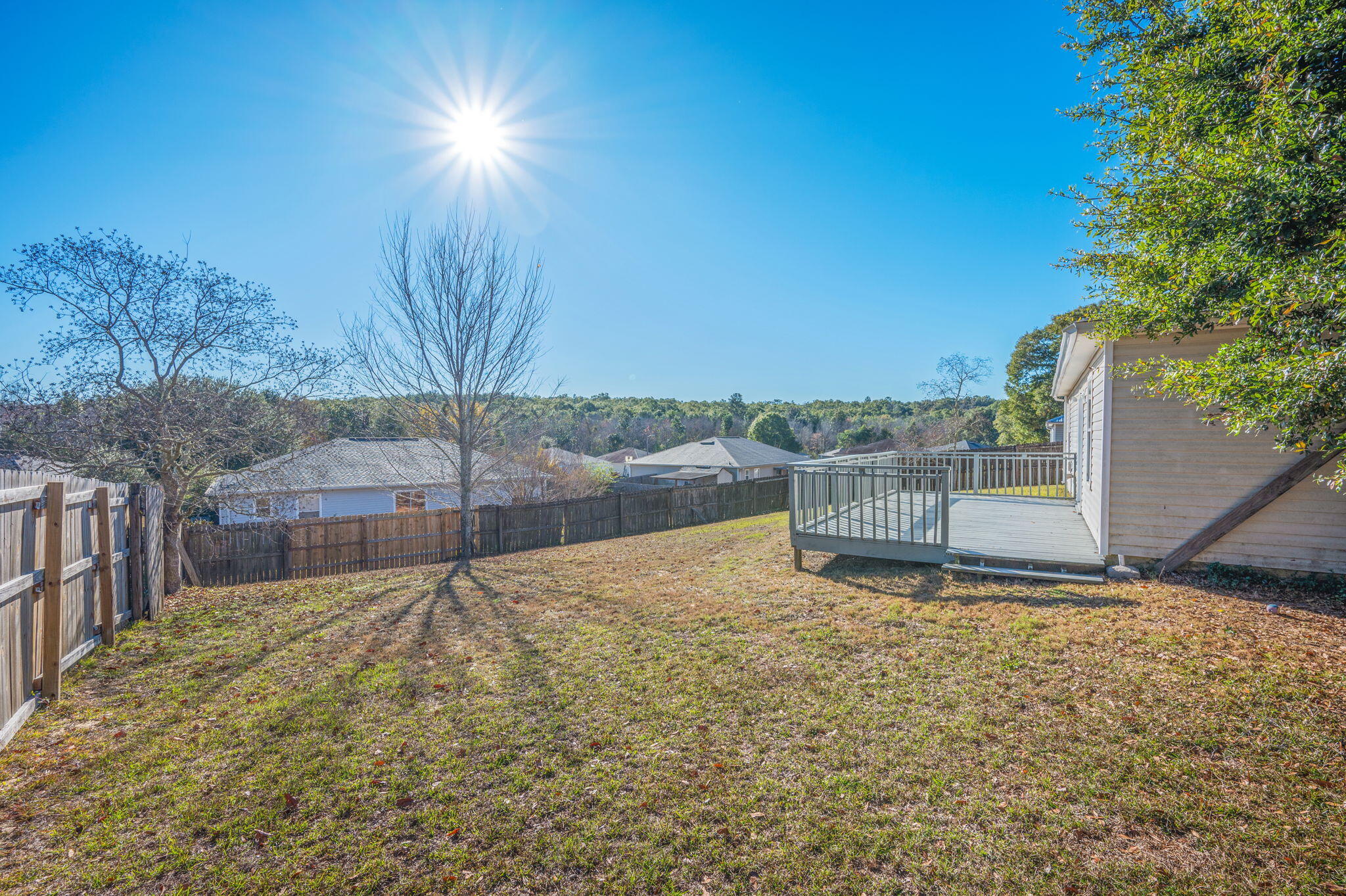 410 Winddrift Court Crestview, FL 32536 - Photo 35 of 44 a view of a yard with wooden fence