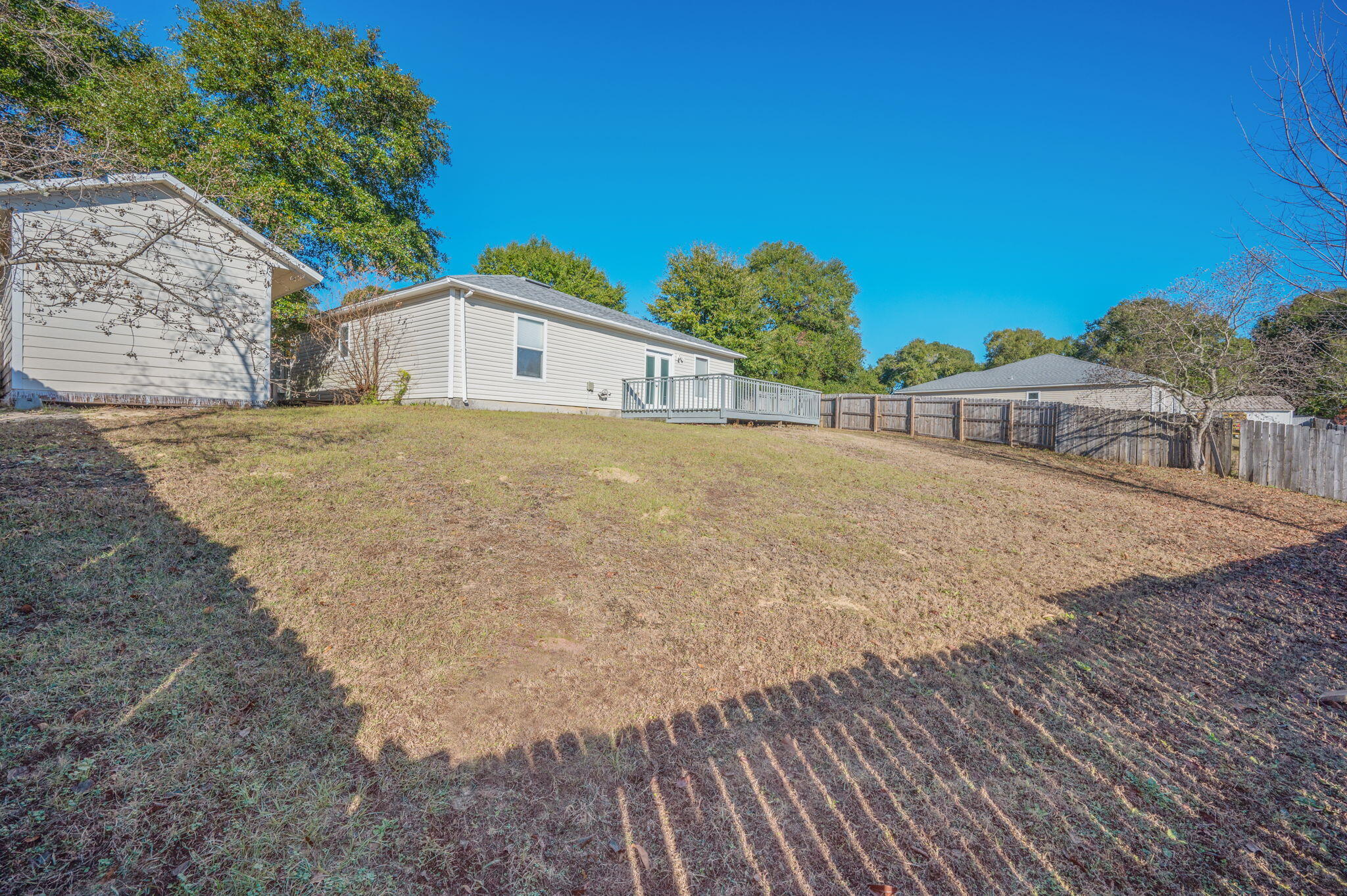 410 Winddrift Court Crestview, FL 32536 - Photo 37 of 44 a view of a house with a yard