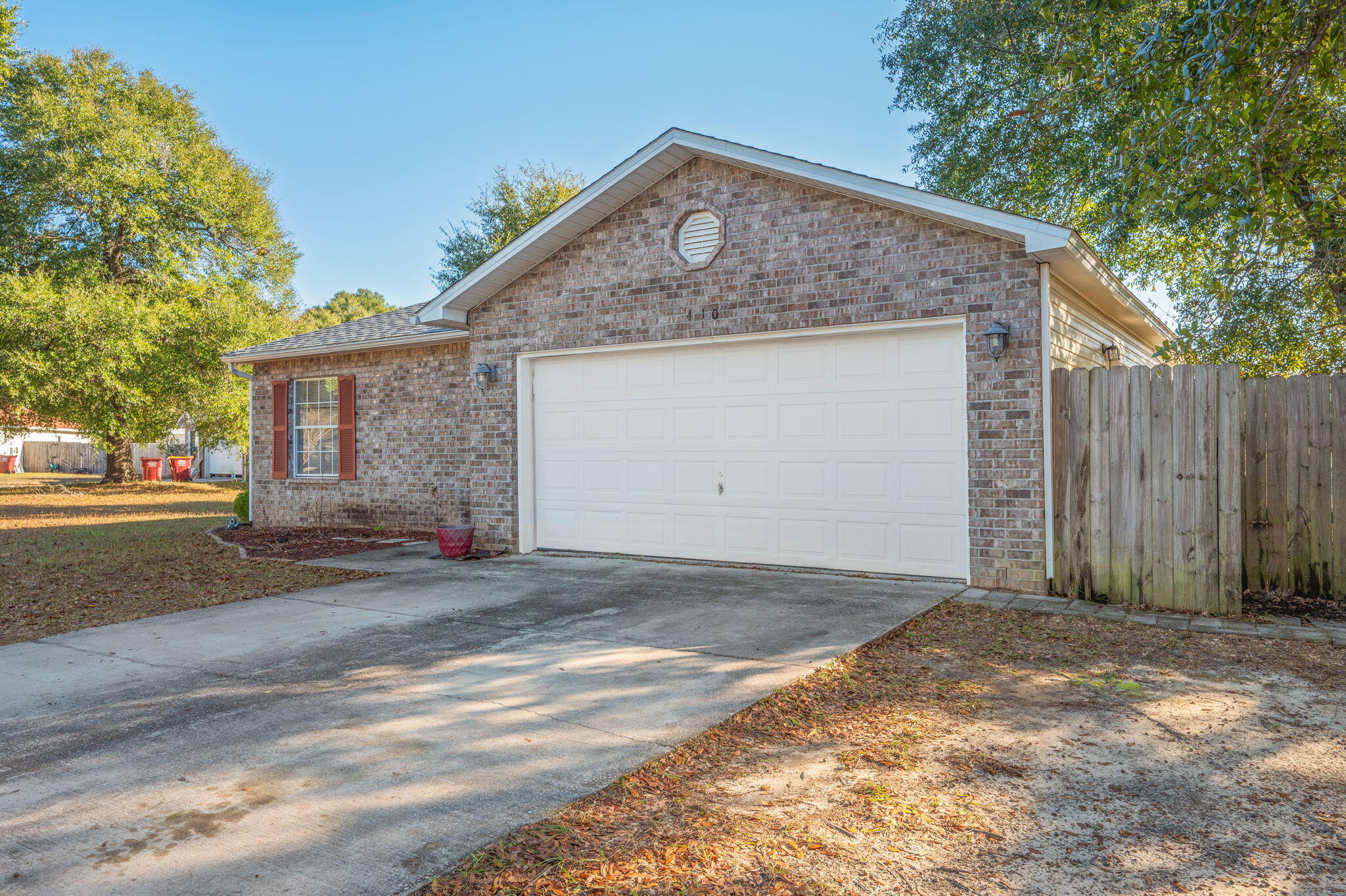 410 Winddrift Court Crestview, FL 32536 - Photo 4 of 44 a front view of a house with a yard