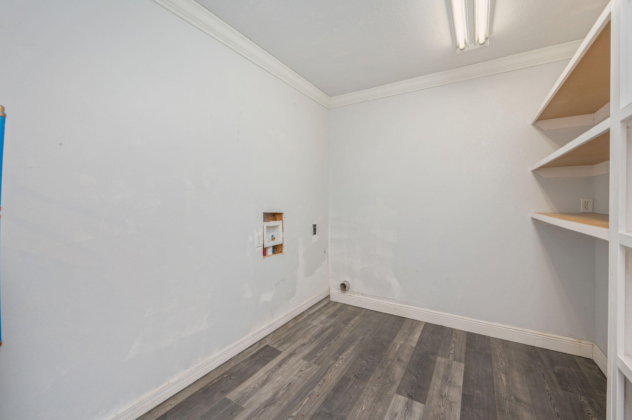 410 Winddrift Court Crestview, FL 32536 - Photo 41 of 44 a view of a room with wooden floor and closet