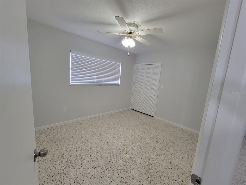 1732 Boca Raton Court Punta Gorda, FL 33950 - Photo 56 of 64 a view of an empty room with a fan
