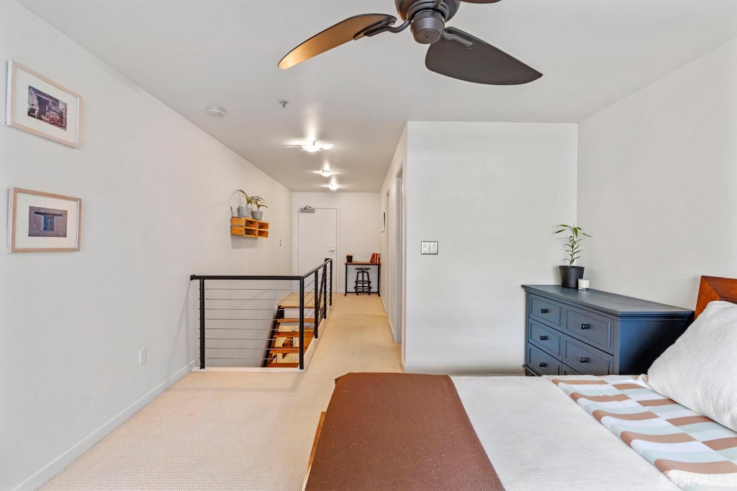 1720 Clay Street, Unit 8 San Francisco, CA 94109 - Photo 18 of 37 a bedroom with a bed and a dresser