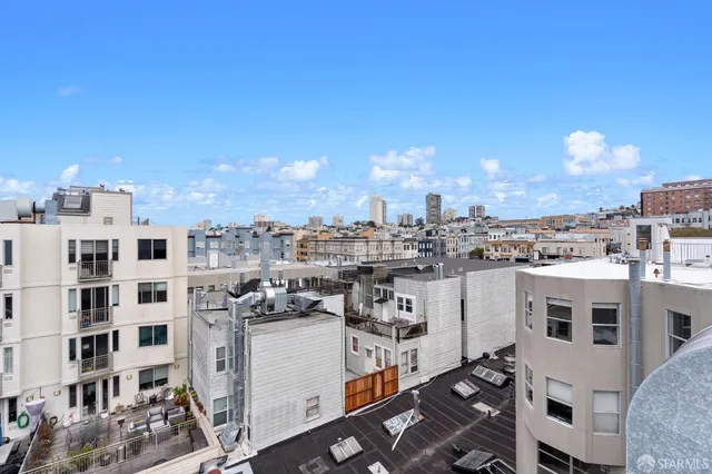 a view of a building from a balcony