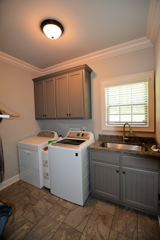 453 Ross Road Waverly Hall, GA 31831 - Photo 23 of 42 Huge laundry room on main level