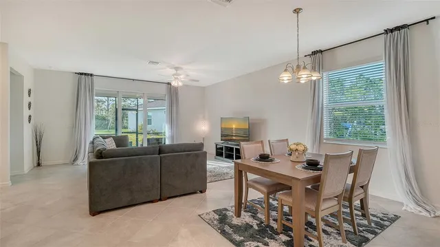 a bedroom with a bed dresser and a window