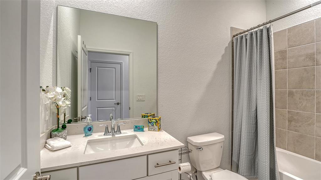 10896 Pinot Drive Venice, FL 34293 - Photo 29 of 70 a bathroom with a sink toilet and shower
