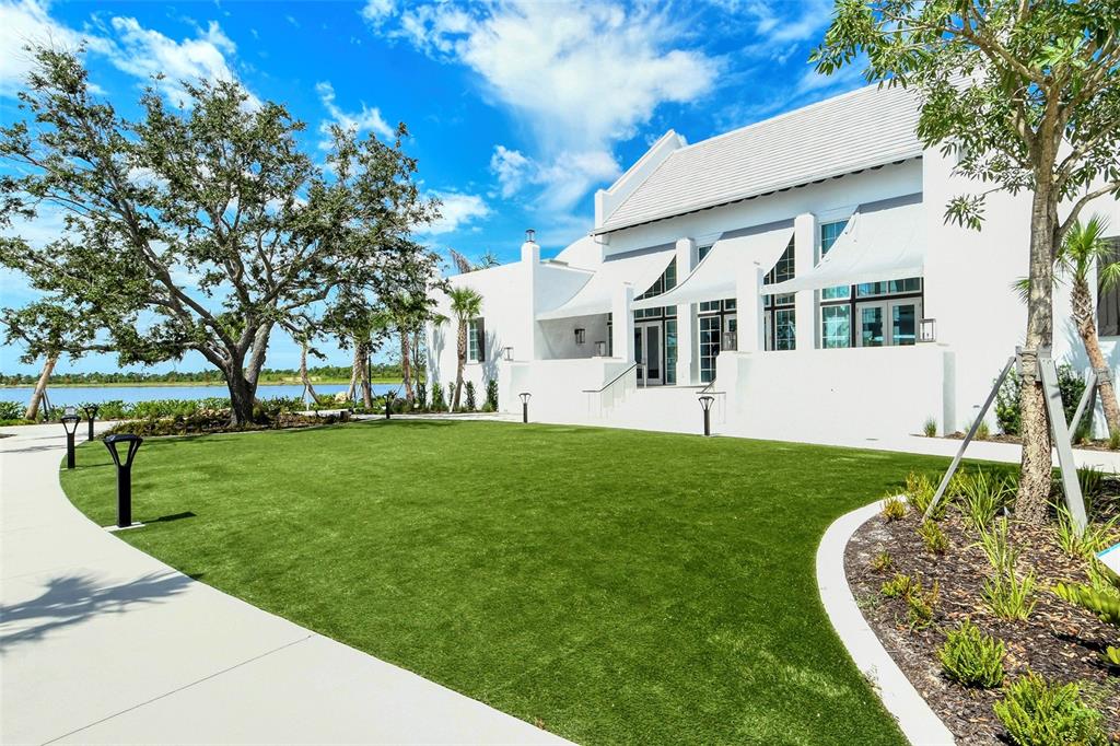 10896 Pinot Drive Venice, FL 34293 - Photo 45 of 70 a front view of a house with garden