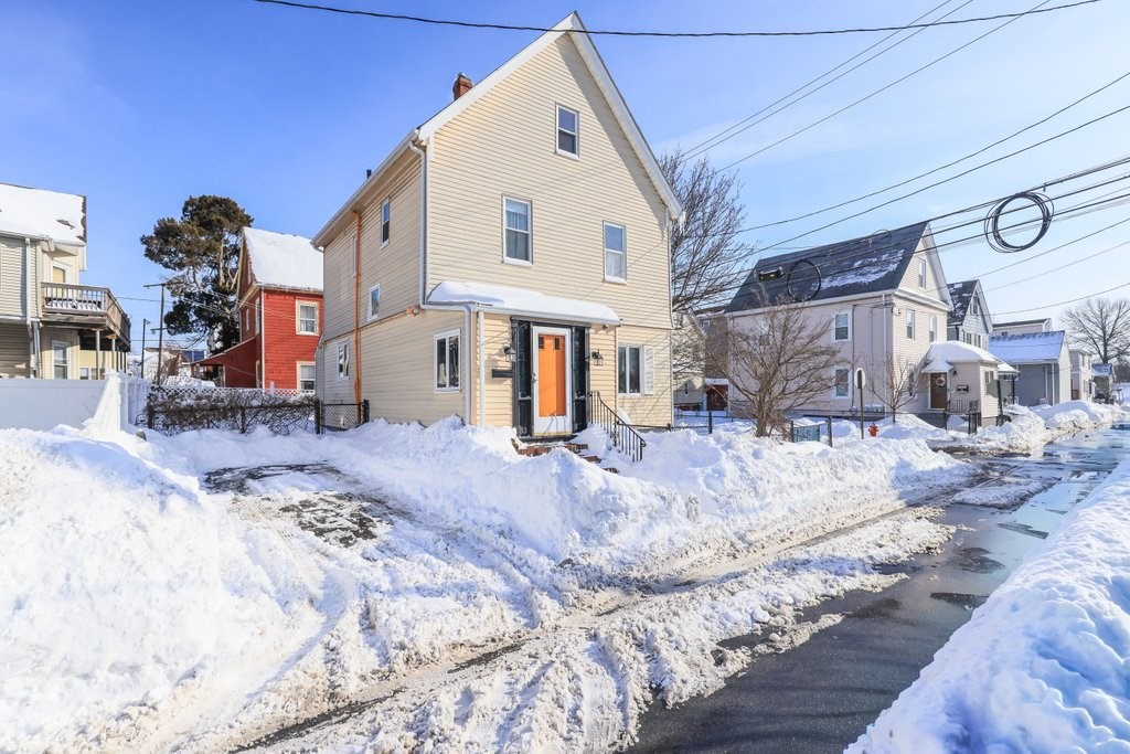 33 Montrose Street Everett, MA 02149 - Photo 1 of 36 a view of a white house with a sink and yard