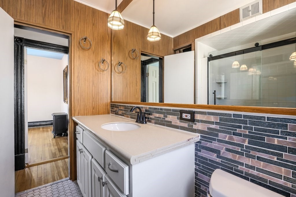 33 Montrose Street Everett, MA 02149 - Photo 16 of 36 a bathroom with a sink and a mirror