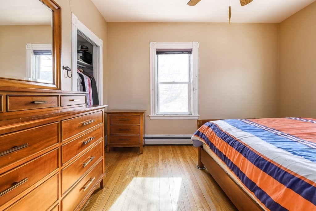 33 Montrose Street Everett, MA 02149 - Photo 20 of 36 a bedroom with a bed and a window