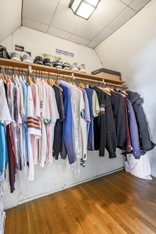 33 Montrose Street Everett, MA 02149 - Photo 24 of 36 a view of walk in closet with clothes and shoes
