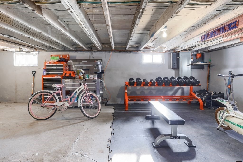 33 Montrose Street Everett, MA 02149 - Photo 27 of 36 a view of garage with bicycles