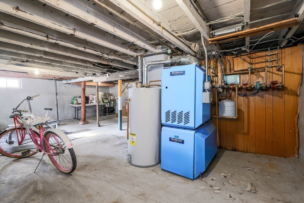 33 Montrose Street Everett, MA 02149 - Photo 28 of 36 a view of a storage room with a lot of stuff