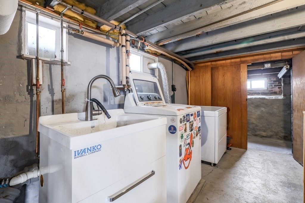 33 Montrose Street Everett, MA 02149 - Photo 29 of 36 a utility room with dryer and washer
