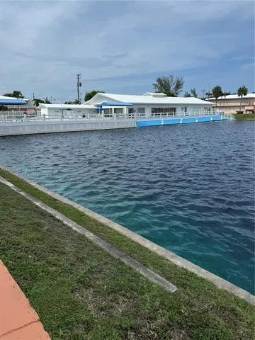 a view of a house with a swimming pool