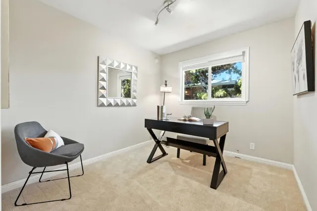 a bathroom with a double vanity sink toilet and shower