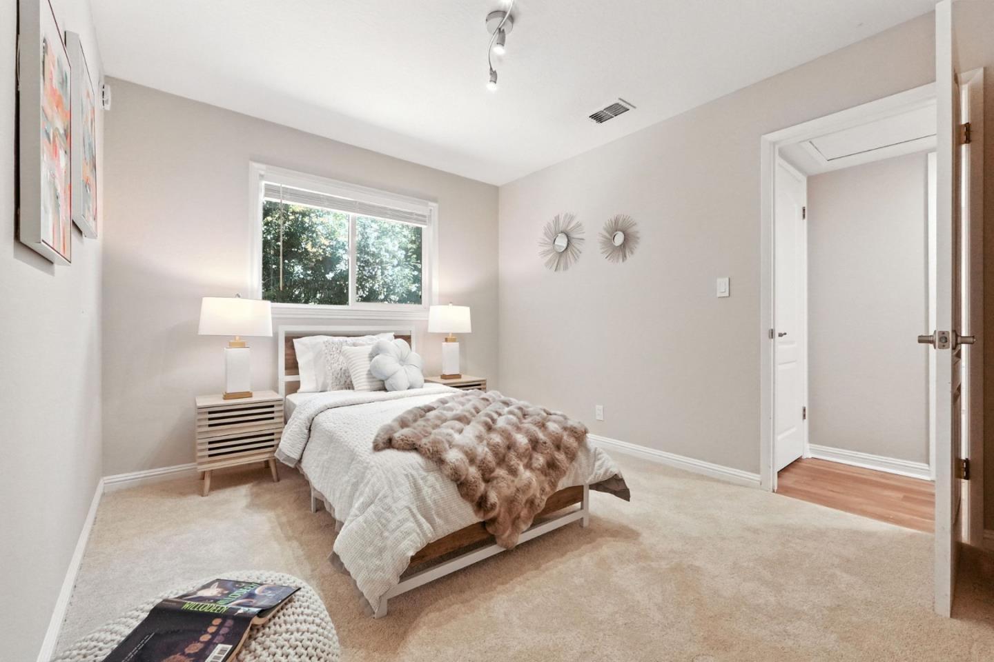 479 Chestnut Avenue Milpitas, CA 95035 - Photo 25 of 27 a bedroom with a bed and a window