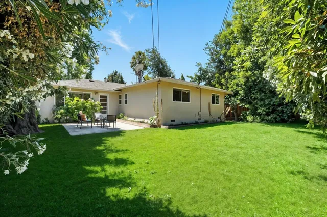 a view of house with garden