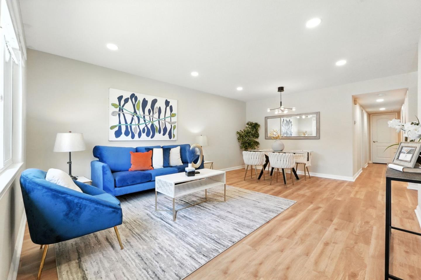 479 Chestnut Avenue Milpitas, CA 95035 - Photo 4 of 27 a living room with furniture and a table