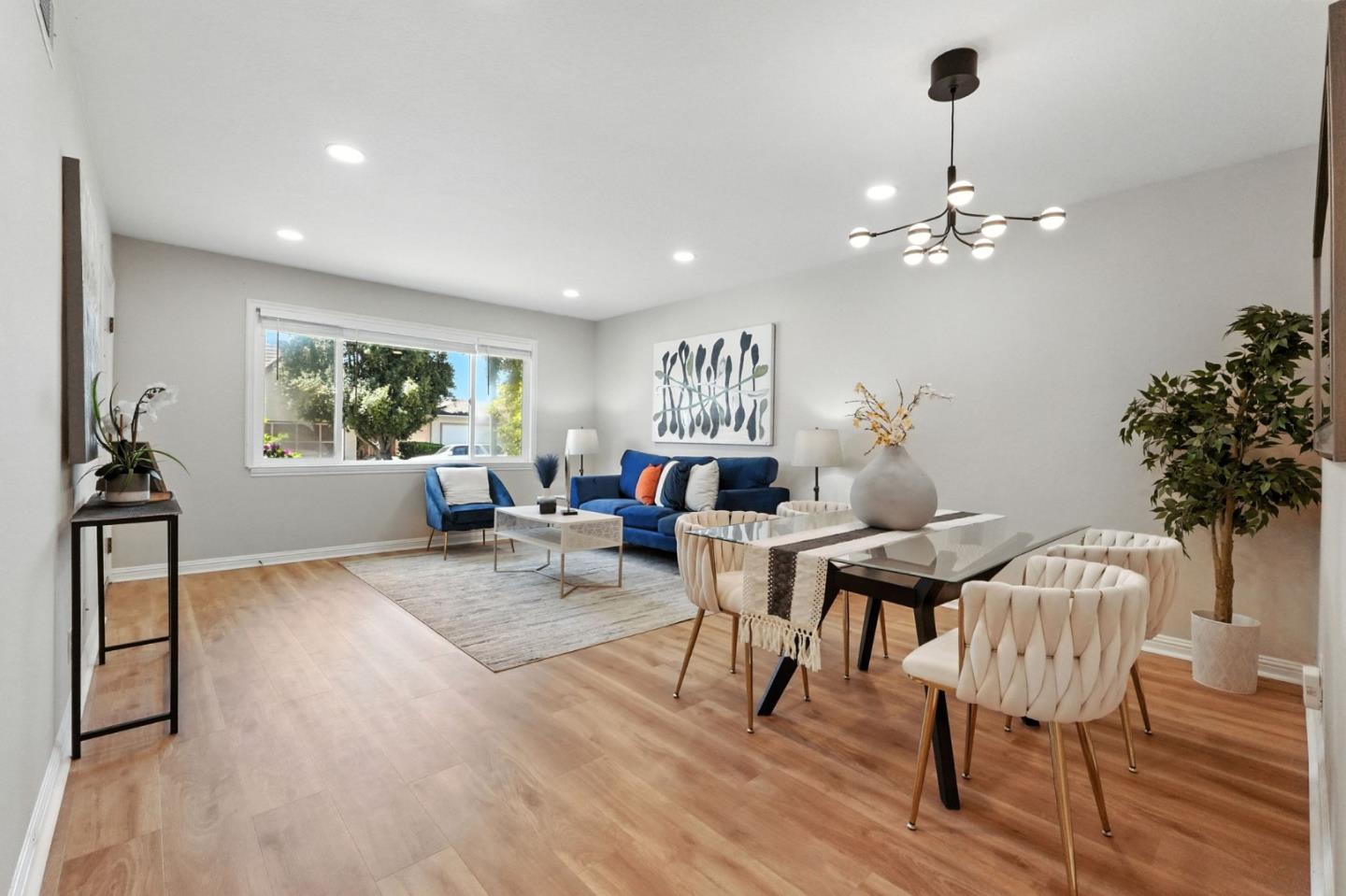 479 Chestnut Avenue Milpitas, CA 95035 - Photo 5 of 27 a living room with furniture a window and a chandelier
