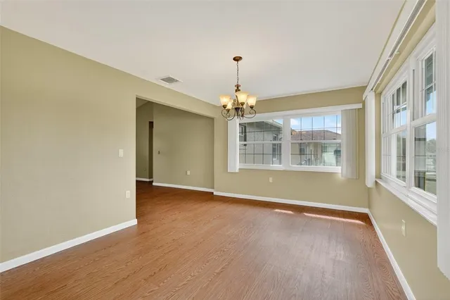 a view of a room with windows