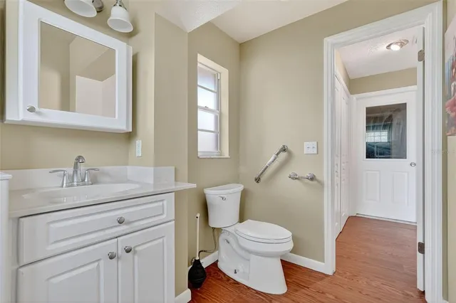 a view of kitchen and wooden floor