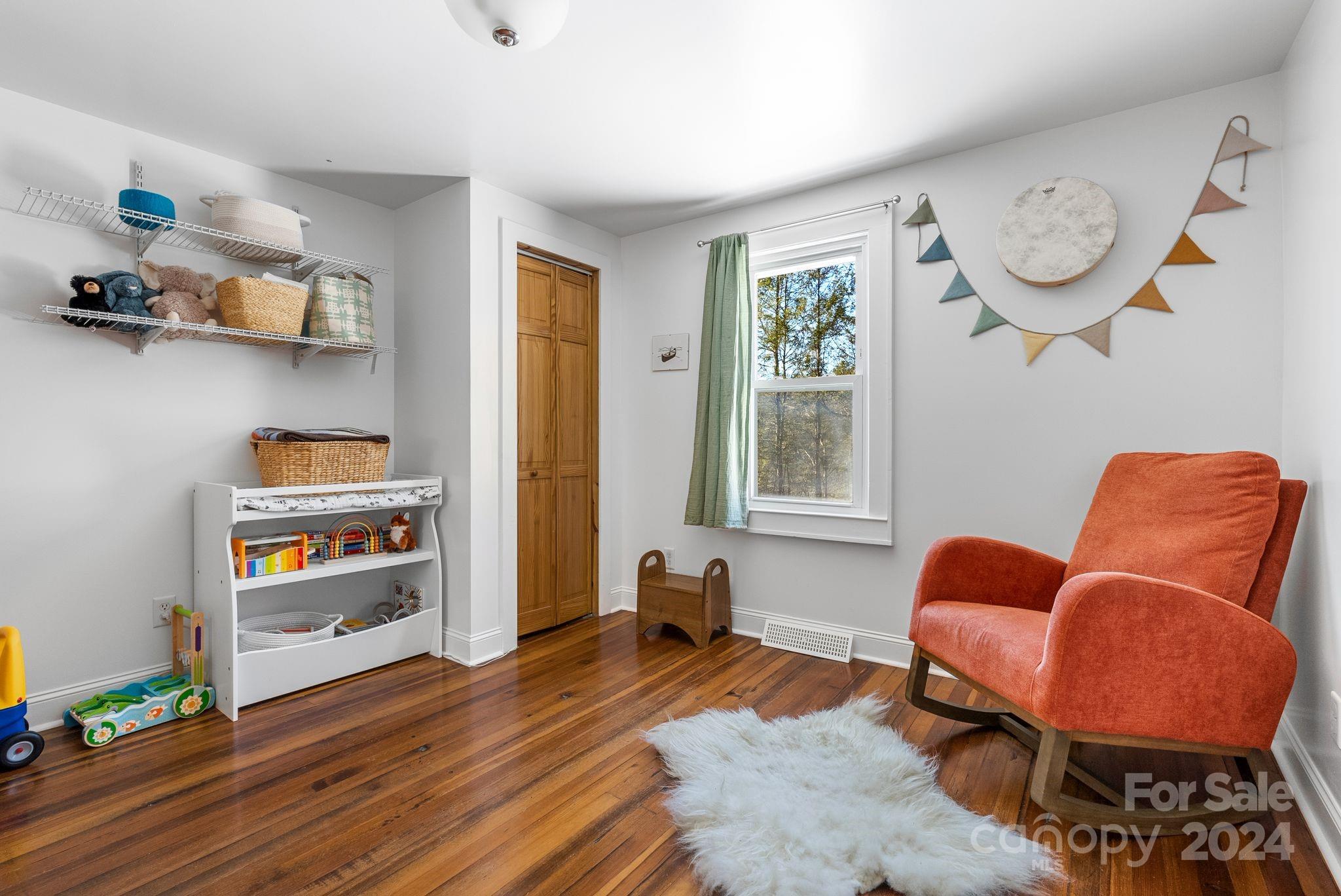 608 Barnard Road Marshall, NC 28753 - Photo 14 of 23 a room with furniture and a window