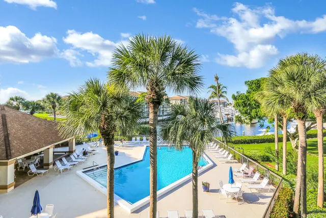 a view of outdoor space with seating area and swimming pool