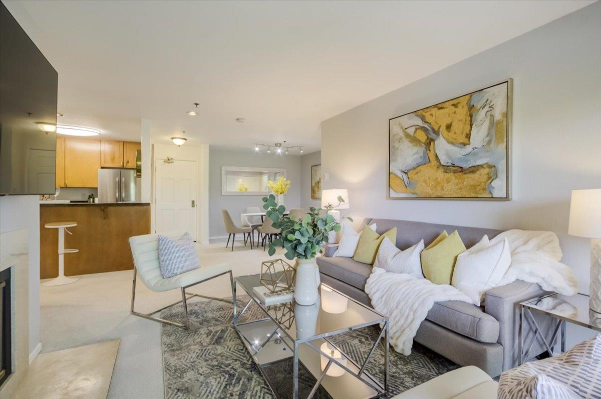300 Murchison Drive, Unit 311 Millbrae, CA 94030 - Photo 3 of 25 a living room with furniture and a painting