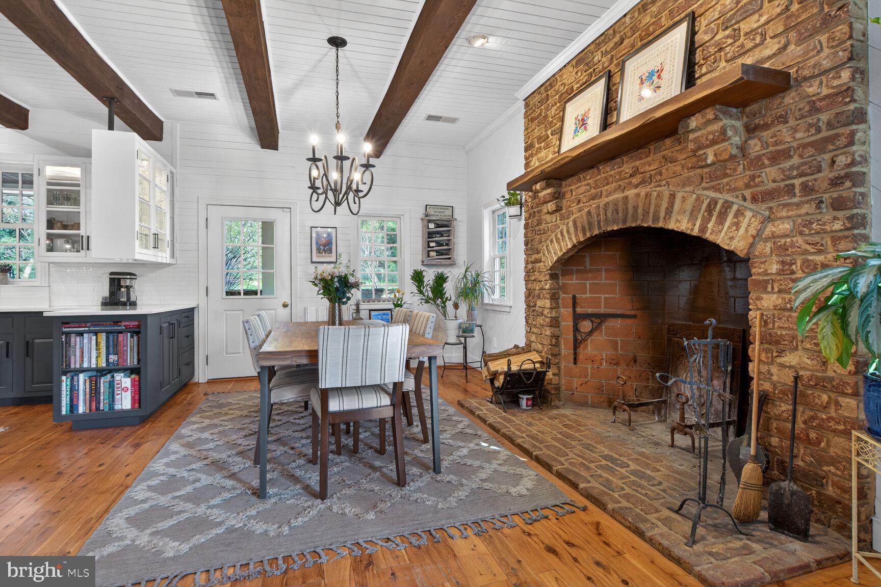 17641 Raven Rocks Road Bluemont, VA 20135 - Photo 19 of 109 Large Chandelier, Exposed Beams, Large Fireplace
