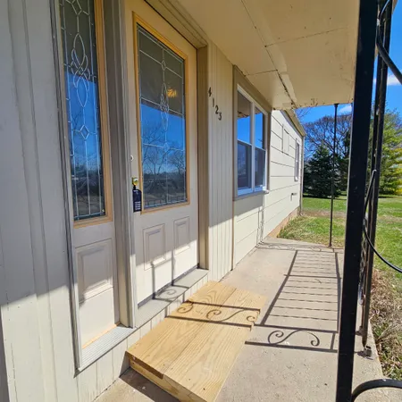 a house view with a outdoor space