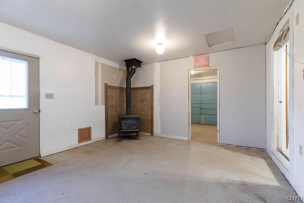 365 Winks Road Palermo, NY 13036 - Photo 21 of 28 Converted attached garage - laundry and wood stove