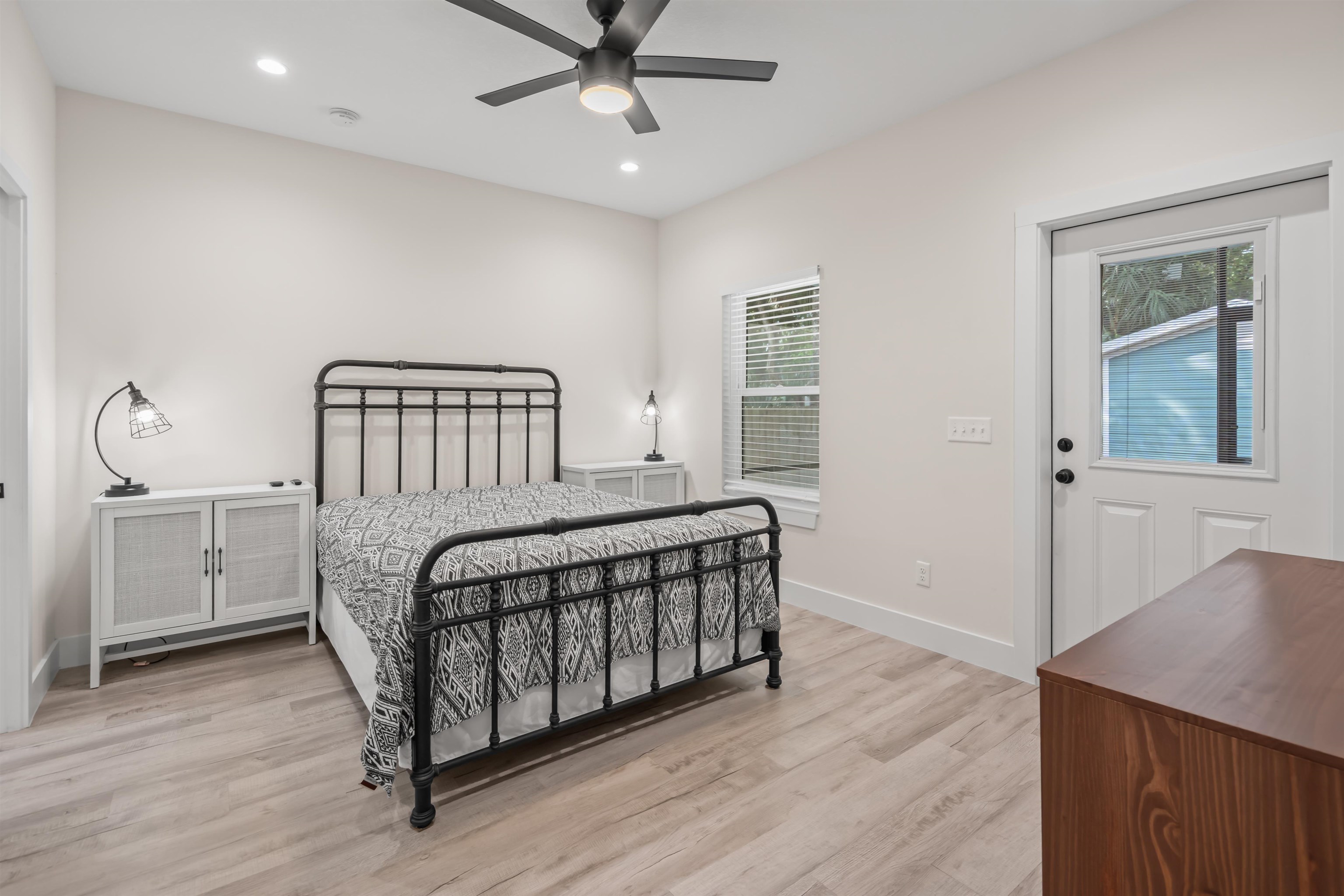 141 Webb Street St. Augustine, FL 32084 - Photo 12 of 33 a bedroom with a bed and a window