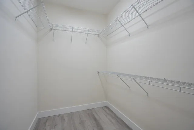 a view of a room with racks on the wall