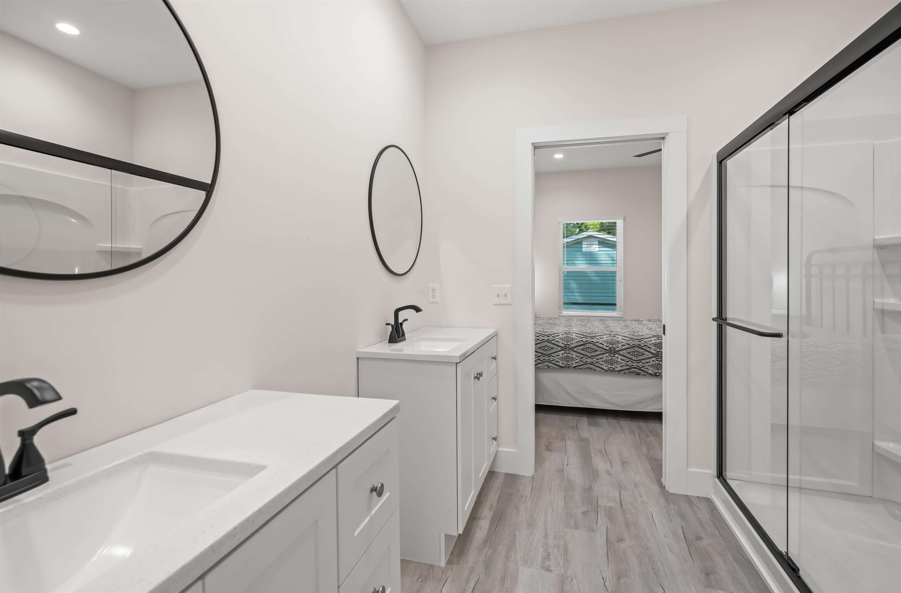 141 Webb Street St. Augustine, FL 32084 - Photo 17 of 33 a bathroom with a sink a toilet and a mirror