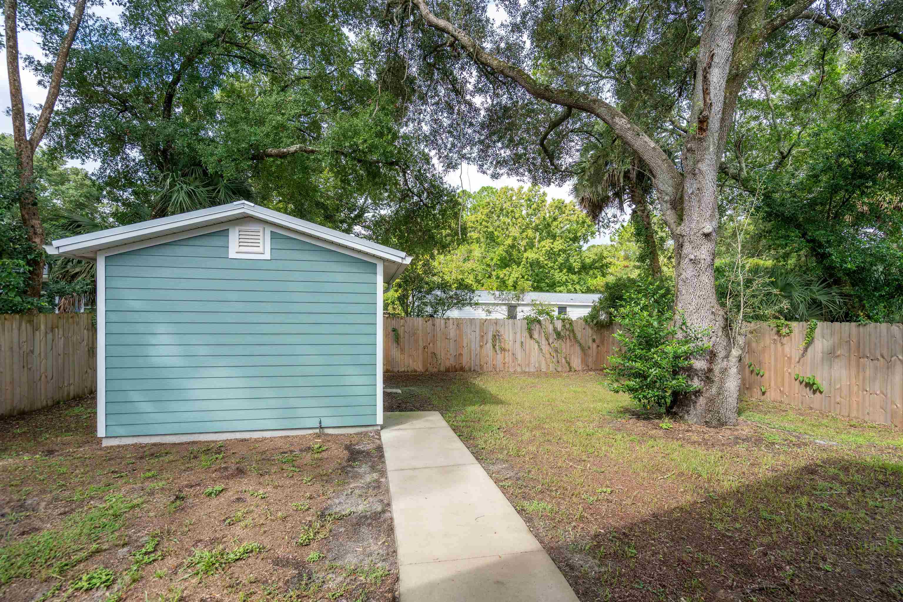 141 Webb Street St. Augustine, FL 32084 - Photo 28 of 33 a view of a backyard