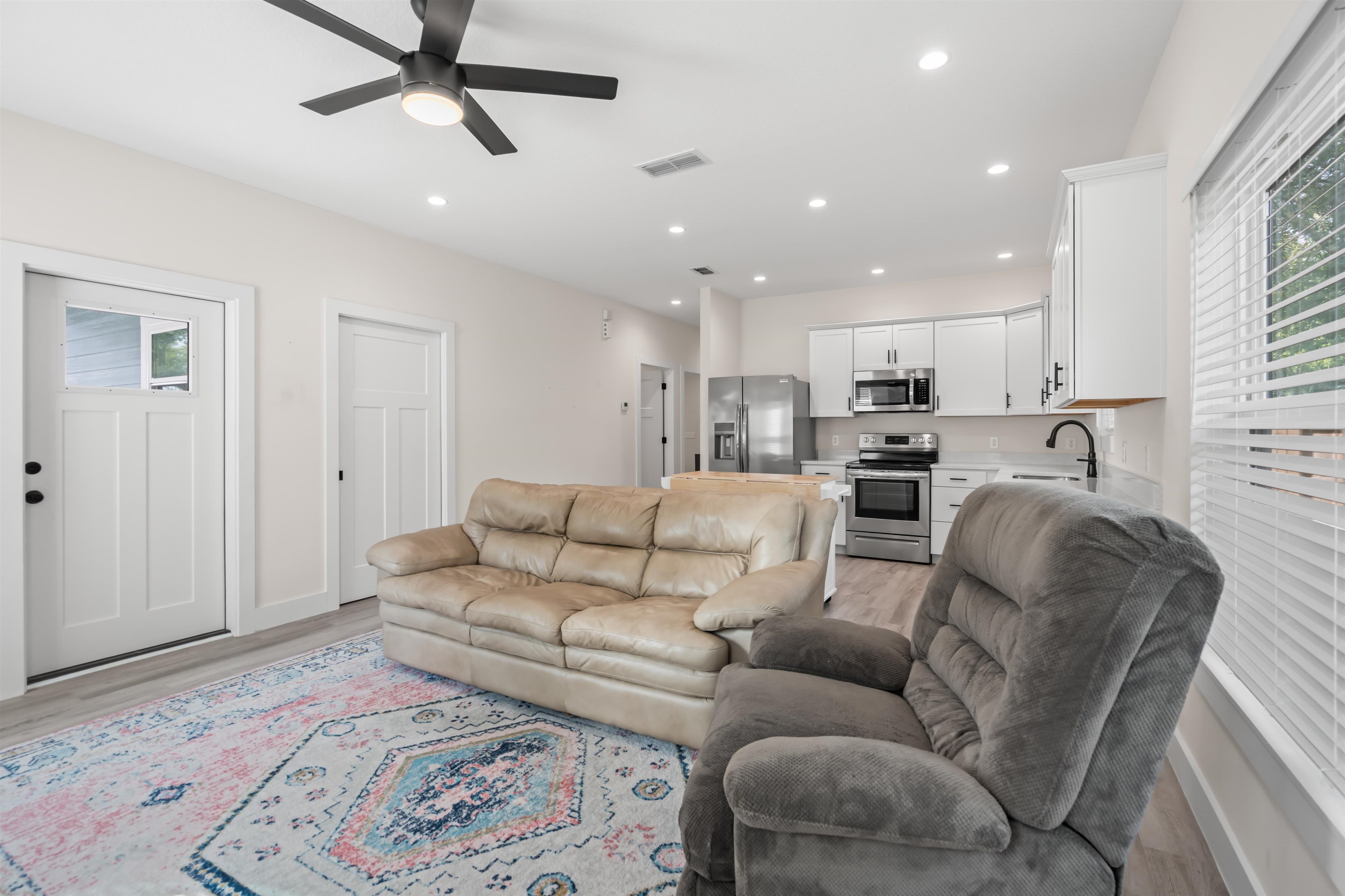 141 Webb Street St. Augustine, FL 32084 - Photo 5 of 33 a living room with furniture and a wooden floor