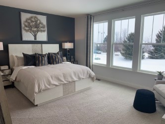 1170 Slade Road South Elgin, IL 60177 - Photo 12 of 29 a large bed sitting in a bedroom next to a window