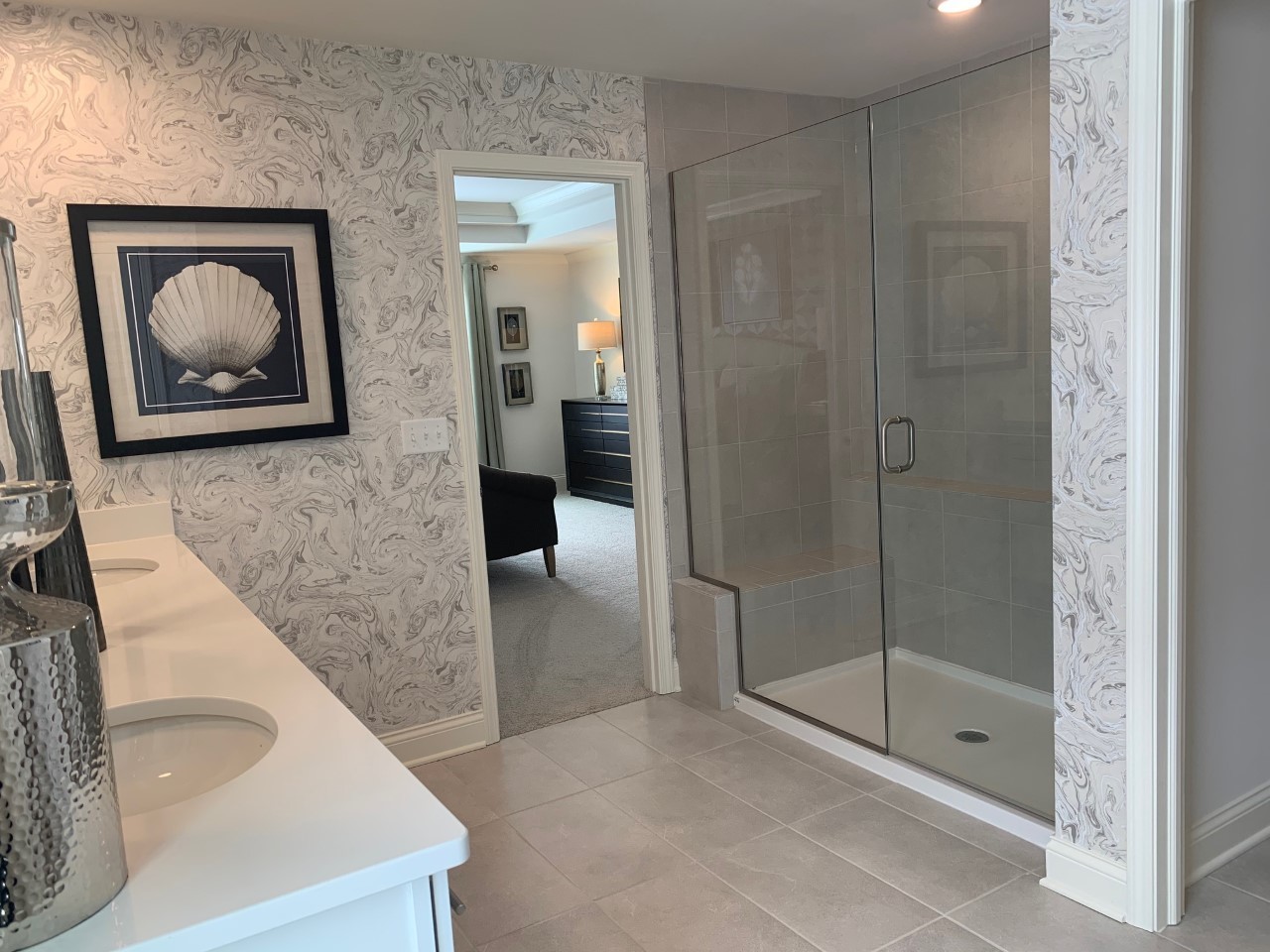 1170 Slade Road South Elgin, IL 60177 - Photo 17 of 29 a bathroom with a sink a mirror and a shower