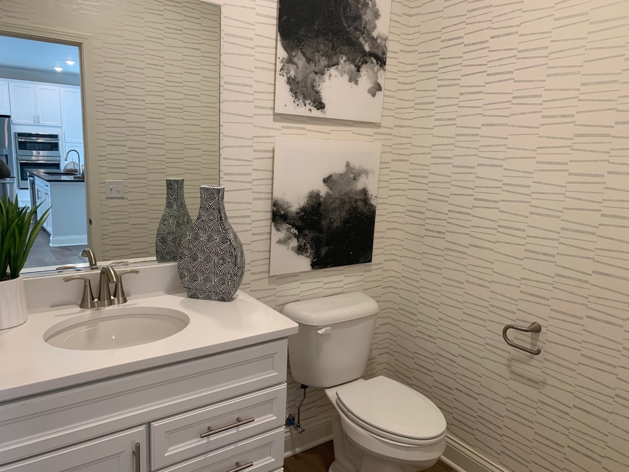 1170 Slade Road South Elgin, IL 60177 - Photo 26 of 29 a bathroom with a toilet a sink and mirror