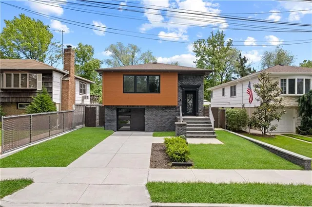 a front view of house with yard