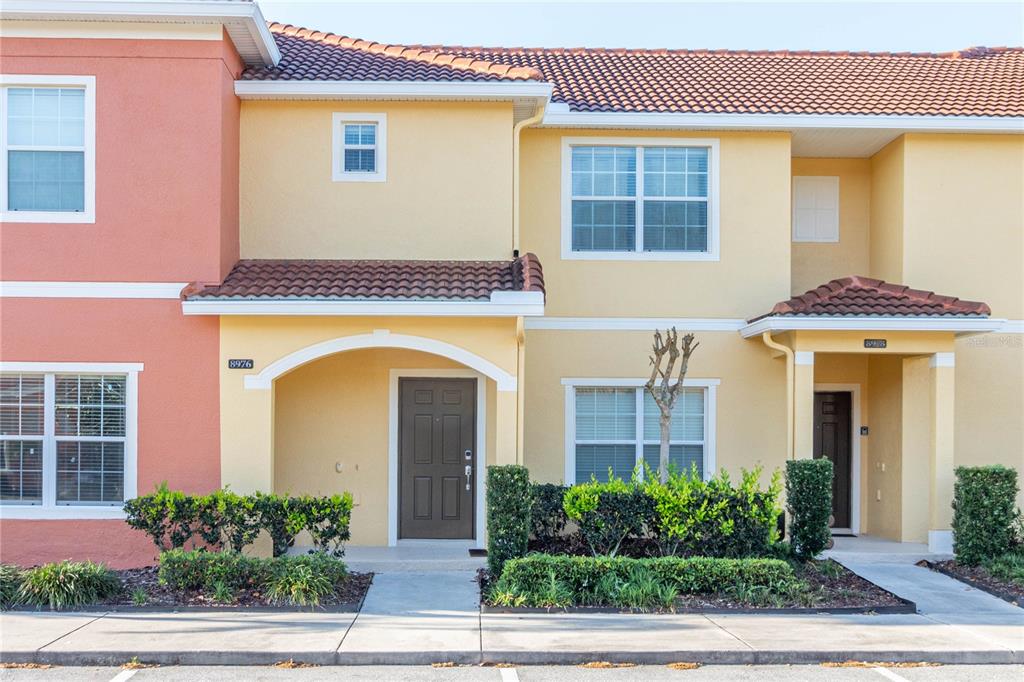 a front view of a house with a garage