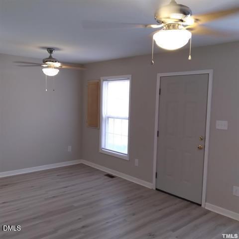 1017 Holmes Street Raleigh, NC 27601 - Photo 6 of 11 a view of empty room with wooden floor