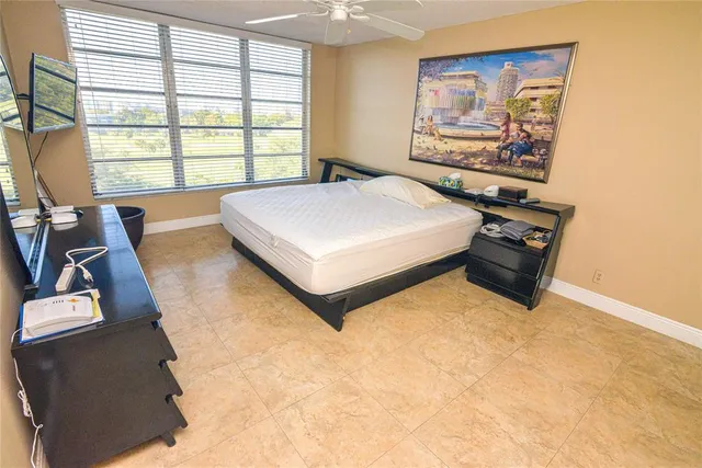 $153,000 | 2661 South Course Drive, Unit 707, Pompano Beach, FL 33069