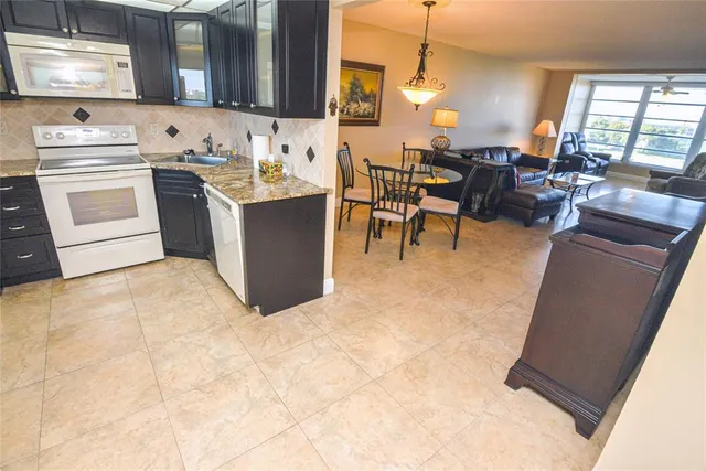 $153,000 | 2661 South Course Drive, Unit 707, Pompano Beach, FL 33069